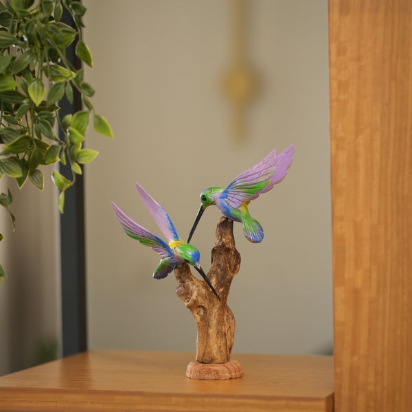 #MulticolorDoubleHummingBirdOnDriftwood