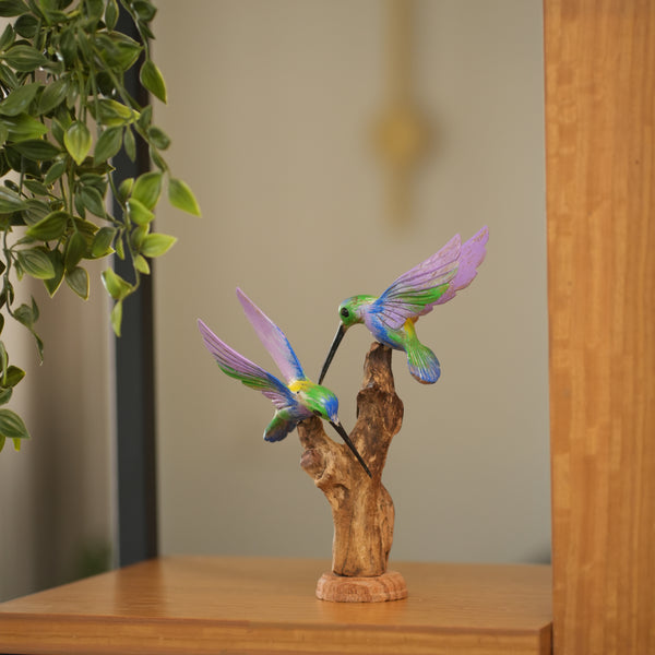 #MulticolorDoubleHummingBirdOnDriftwood